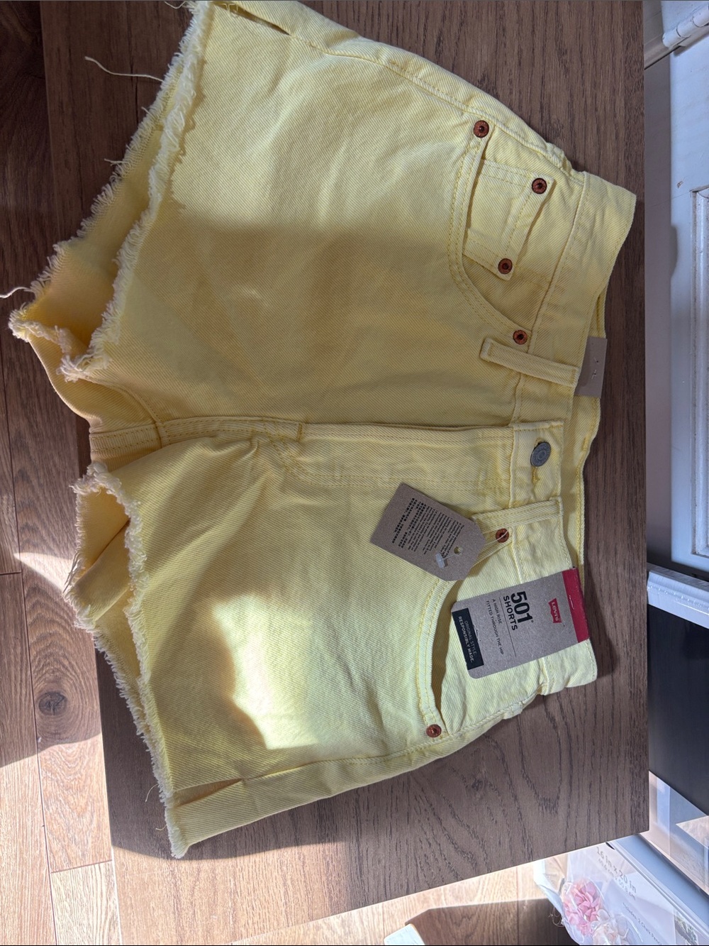 Levi's Yellow Frayed Hem Denim Shorts